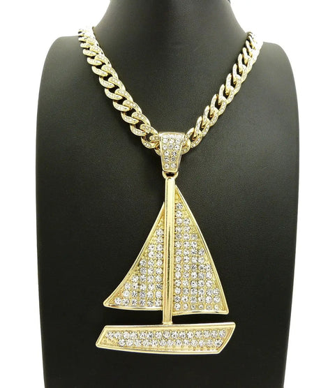 Gold Tone Sailing Yacht Pendant On 10mm Cuban Chain Necklace, 30 Inch Iced Out Bling Jewelry For Men displayed against black.