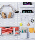 Front view of 4 Pack White Pegboard Panels for Walls Heavy Duty PP Plastic Pegboard Wall Organizer with accessories installed