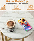 Top view of Marble Top C Shaped End Table With Gold Metal Frame, displaying coffee cup and smartphone on the marble surface.