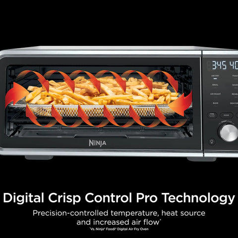 Digital Air Fry Pro Countertop Oven With Extended Height And XL Capacity showcasing fries inside using Crisp Control Technology