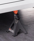 Beefy 3 Ton Car Jack Stands With Double Locking Adjustable Height From Ten Point Eight To Sixteen Point Three Inches in use under vehicle