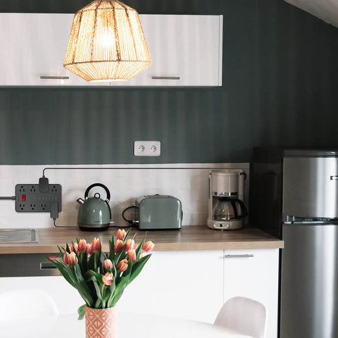 Kitchen setup with Ten Foot Extension Cord Power Strip With Eight Widely Spaced Outlets And Six USB Ports Including One USB C Flat Plug