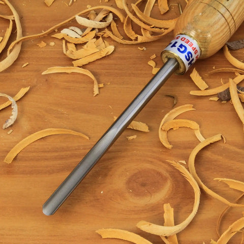 Pro Grade Three Piece Spindle Gouge Set For Woodturning Built Tough For Heavy Duty Cuts With Rock Solid Beech Handles on wood shavings.