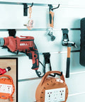 Premium Heavy Duty Slatwall Hooks And Hangers Set 20 Pack For Garage Storage And Organization Single And Double Hooks Proslat Compatible Slatwall Accessories in use, organizing tools on a slatwall system.
