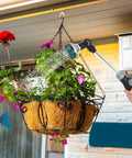 17.5 Inch Garden Hose Watering Wand With Eight Spray Patterns, Thumb Flow Control, watering a hanging basket