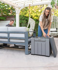 Versatile Outdoor Storage Cube Deck Box Doubles As Cozy Bench Seat And 25 Gallon Capacity Weather Resistant patio organizer open for storage.