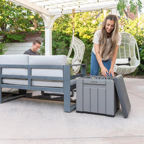 Versatile Outdoor Storage Cube Deck Box Doubles As Cozy Bench Seat And 25 Gallon Capacity Weather Resistant patio organizer open for storage.