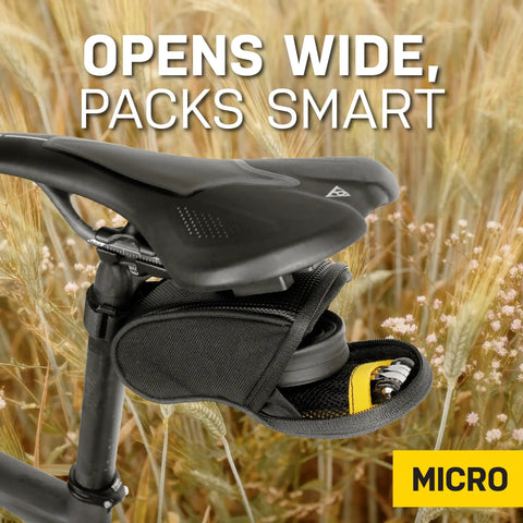 Micro Aero Wedge Seatpost Bag With Fixer F11 for 27.2 to 34.9 mm posts, black durable 1000D nylon, attached to a bicycle seat