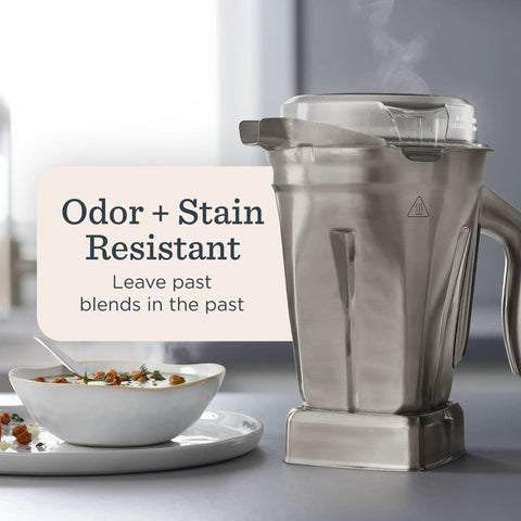 48-Ounce Stainless Steel Blender Container With Self-Detect next to soup bowl, showcasing odor and stain resistance.
