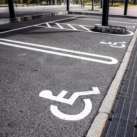Handicap Parking Lot Stencil 48 By 48 Inches Heavy Duty Plastic Reusable Made In The USA marking on asphalt parking space