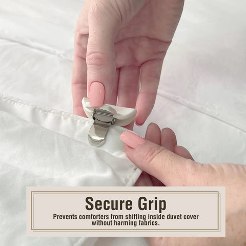 Hands attaching No Slip Comforter Clips For Duvet Covers 4 Pack Keeps Blanket From Bunching Or Shifting While You Sleep