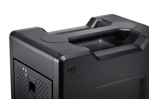Close-up of Heavy Duty 72TB Thunderbolt 3 Raid Drive Array showing matte black housing and handle for portability.