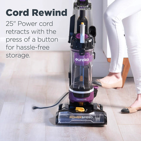 Upright purple Eureka PowerSpeed vacuum with clear dust bin and automatic cord rewind