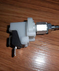 Side view of Rugged Pro Grade Heavy Duty Air Foot Pedal Pressure Switch for Drain Cleaning Machines with barbed end fitting