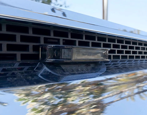Close-up of Smoked Lens Amber LED Grille Lights Kit for 2014-2021 Toyota Tundra with smoked lens and IP66 housing.