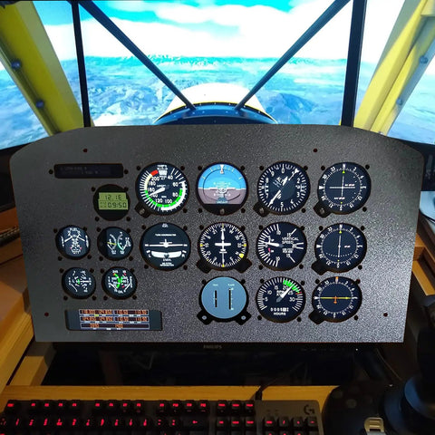 Flight simulator cockpit panel with various control dials and screens, yellow and black airplane visible through windows in background.
