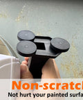 40 Pound Rubber Coated Neodymium Magnets With M6 Threaded Studs shown in hand against metal surface