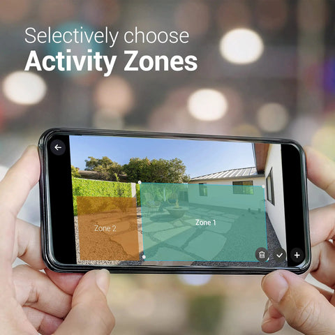 Hands holding smartphone showing Spotlight HD WiFi Security Camera For Indoor And Outdoor Use With Color Night Vision app interface.
