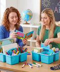 Two women using 24 Pack Classroom Caddies Bulk With 3 Compartments And Easy Grip Handle Plastic Stackable Storage Caddies on a desk