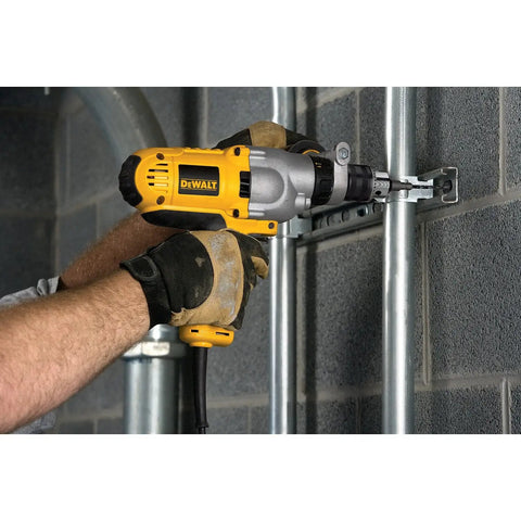 Person using Corded Hammer Drill Kit With Half Inch Capacity And Ten Amp Power For Masonry Wood And Steel Drilling Dual Mode Hammer And Drill Built For Pros And Serious DIYers Who Need Beefy Power on metal surface