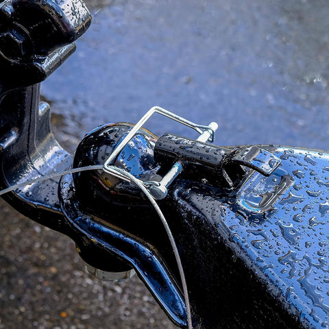 Ten Pack 2.75 Inch By 0.25 Inch Trailer Pins For Hitch, Shaft Locking, Coupler, PTO And Lock Pins installed on a wet trailer hitch
