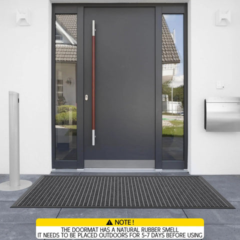 All Weather Front Door Mat Indoor Outdoor 72 Inch By 36 Inch Non Slip Rubber Backing Welcome Floor Mat For Patio And Garage Entrance Built Tough To Stop Mud Dirt And Moisture Stain And Fade Resistant Heavy Traffic Commercial Grade Doormat placed at an entrance.