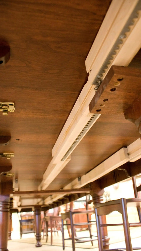 Heavy Duty Soft Maple Table Slide Set Built Like A Tank For Quick Room Flex, showing sliding mechanism under the table.