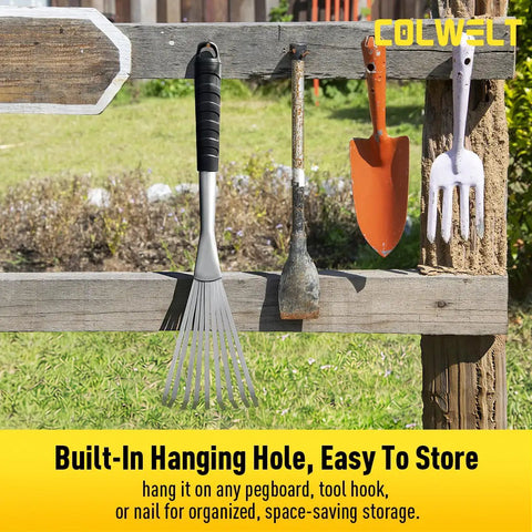 Hand Rake 16.5 Inches For Tight Spots And Flower Beds With 9 Flat Tines hanging on wooden fence next to garden tools