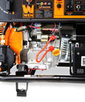Close-up of Beefy Dual Fuel Electric Start Portable Generator With Wheel Kit And CO Shutdown Sensor, engine details visible