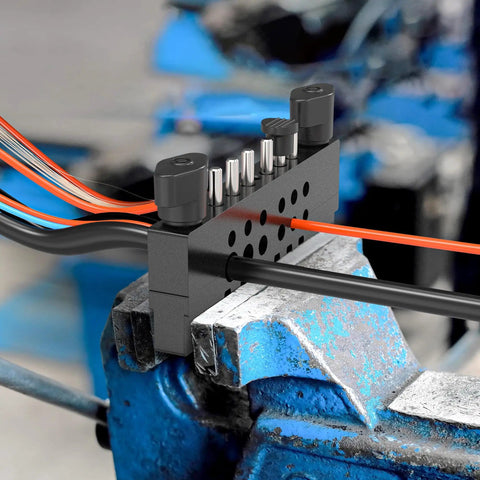 Beastly Split Type Scrap Copper Wire Stripper Kit With 6 Tungsten Carbide Tri Blade Cutters in use on blue workbench
