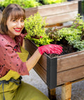Woman gardening near raised garden bed with Set Of Eight Beefy Raised Garden Bed Corner Brackets With Wood Screws For 20 To 24 Inch Beds.