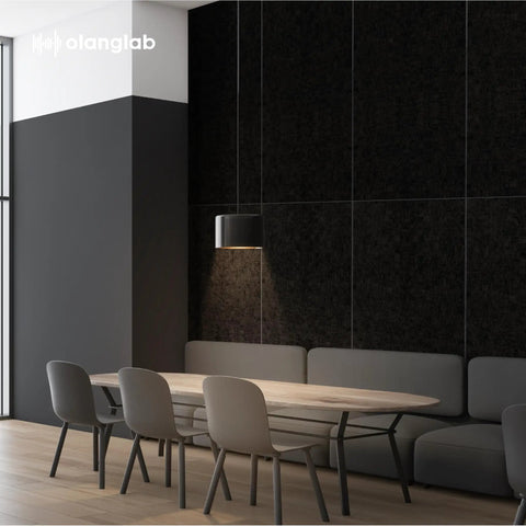 Acoustic Wall Panels 10 Pack For Home Studio And Office installed in modern meeting room, showing plain black felt surface.