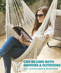 Woman reading in a Cotton Rope Hammock Chair With Macrame Swings, Handmade Hanging Seat for indoor outdoor use, natural white color.