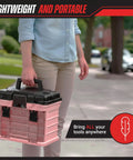 Person carrying a pink tool box organizer with removable compartments for crafts beads screws and small tools portable grab and go storage case.