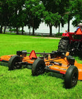 Genuine Replacement U Joint Yoke With 1-1/2 Bore For Hd210r 4 Batwing And Lawn Mower Cutters Plus Tractor Attachments in use on grass.