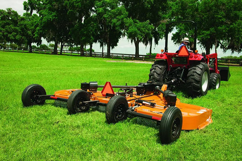 Genuine Replacement U Joint Yoke With 1-1/2 Bore For Hd210r 4 Batwing And Lawn Mower Cutters Plus Tractor Attachments in use on grass.