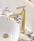 Avallon Single Hole Bathroom Faucet With High Arc Sleek Spout Single Handle Operation Pro Grade Solid Brass Construction 1.2 GPM Flow Rate Brushed Gold Finish Built To Last All Day Use installed on marble vanity