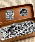 12 Piece Aircraft Mechanic Stickers Pack Dope Aviation Decals For Planes And Maintenance Techs in a brown tin box