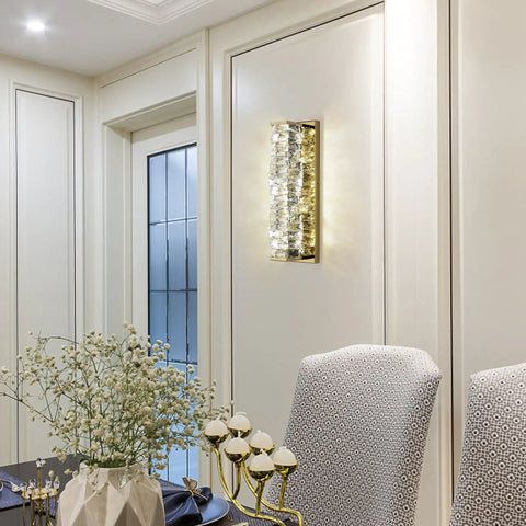 Lit Crystal Glass Wall Sconce In Gold Finish, Mid Century Modern Lighting in elegant dining room setting