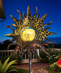 Sun Powered Solar Garden Light Stake With Crackle Glass Metal Finish illuminating a patio, highlighted by floral patterns.