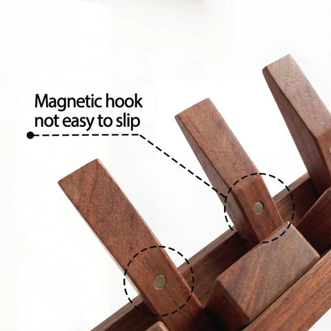 Magnetic hooks detail on Dope Mid Century Modern Walnut Foldable Entryway Wall Coat Rack With Shelf And 9 Hooks.