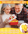 Elderly couple opening gift box with small yellow rubber ducks, highlighted with text 'Ducks are soft and compressible'.