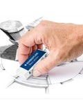 Hand using Mars Plastic Vinyl Erasers 4 Pack White Erasers For Clean And Precise Erasing Latex Free With Minimal Crumbling Great For Students And Artists Made In Peru on pencil drawing.