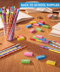 Back To School Gift Set 96 Pcs Pencil Eraser Pack For Kids Classroom Fun Colorful Scented Pencils With Inspirational Quotes And Cute Wood Erasers Bulk School Supplies For Students And Teachers displayed on a desk.