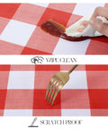 Rectangle Vinyl Tablecloth Waterproof Buffalo Gingham Red For Outdoor Picnics And Camping Heavy Duty Wipeable Table Cover 54 X 78 Inches showing stain-resistant feature and scratch proof with fork.