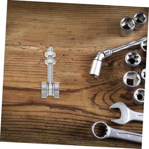 Built Like A Tank Stainless Steel Sliding Door Hanger With Double Bearing Track Rollers on wooden surface with tools.
