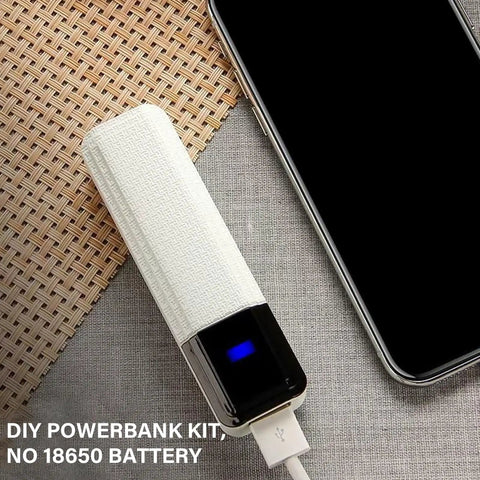 Solid Travel Charging Case For Single Flat Top Battery Emergency Phone Juice Pack And Tablet Backup Power Rig That Keeps Your Gadgets Suped Up And Rolling on a table beside a smartphone.