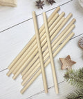 Solid Birch Wood Dowel Rods For Crafting, 3/8 X 12 Inch Unfinished Wooden Sticks, 10 Pack on a wooden surface.