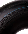Close-up of 2 Pack 15x6.00-6 Inner Tubes with TR13 Straight Valve Stem, showing tire size marking on rubber surface.