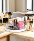 12 Inch Lazy Susan Turntable With Removable Bins And Dividers, organizing makeup and cosmetics on a vanity table.